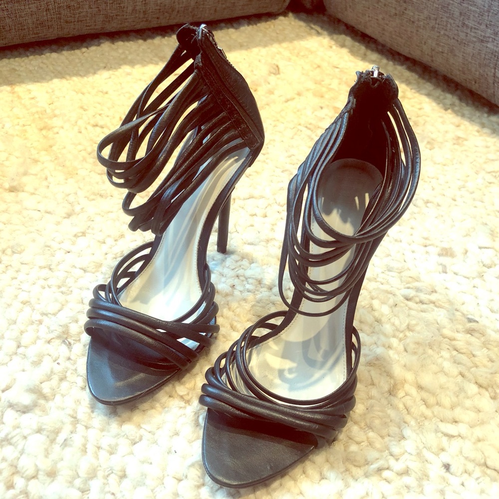 Herve leger strapped leather heels.